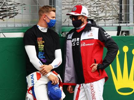 קימי רייקונן בשיחה צפופה עם מיק שומאכר