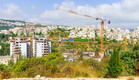 אתר בנייה בשכונת נווה שאנן בחיפה (צילום:  RnDmS, shutterstock)