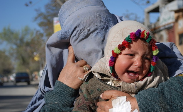 תינוקת אפגנית (צילום:  Lizette Potgieter | shutterstock)