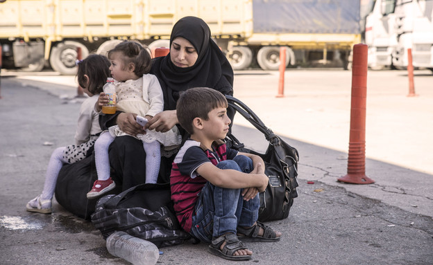 פליטים סורים (צילום: Procyk Radek, shutterstock)
