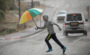 ילד בגשם (צילום: יוסי אלוני, פלאש 90)