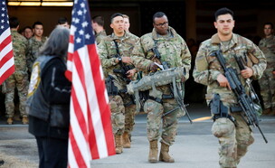 חיילים אמריקנים בדרכם למזרח אירופה (צילום: רויטרס)