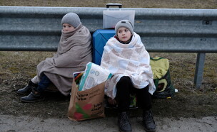 ילדים בגבול פולין אוקראינה (צילום: רויטרס)
