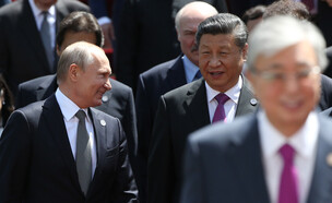 נשיא רוסיה ולדימיר פוטין ונשיא סין שי ג'ינפינג (צילום: Mikhail Svetlov/Getty Images)