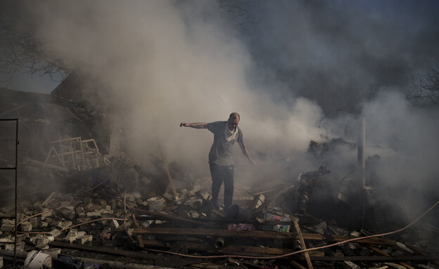 חשד לפשעי מלחמה בחארקוב (צילום: AP Photo/Felipe DanA)