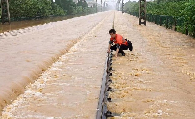 שטפונות כבדים בדרום סין (צילום: AP)