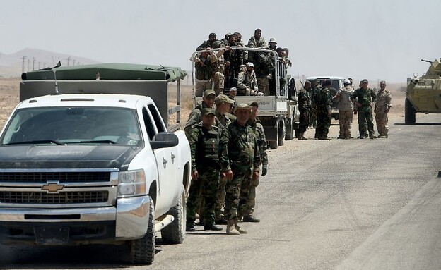המתיחות הצבאית מעבר לגבול (צילום: VASILY MAXIMOV/AFP/GettyImages)