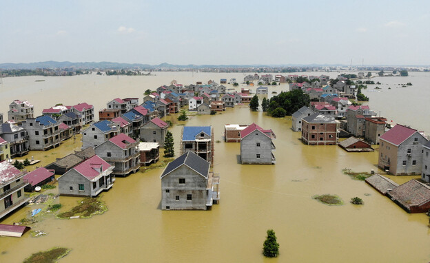 שטפונות במחוז ג'יאנגשי, סין (צילום: רויטרס)