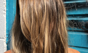 אישה עם שיער ארוך (צילום: getty images)