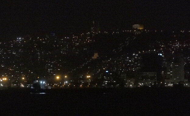 האורות של חיפה בסוף המסע (צילום: חדשות 12)