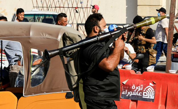 עיראק: תומך א-סדר חמוש ב-RPG (צילום: reuters)