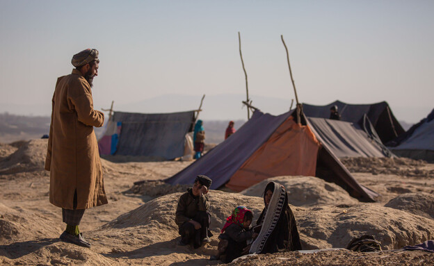 פליטים אפגניסטן (צילום: Amors photos, shutterstock)