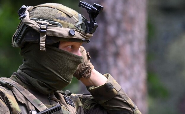 כוח הצבא המקומי בפעולה (צילום: CHRISTOF STACHE/AFP/GettyImages)