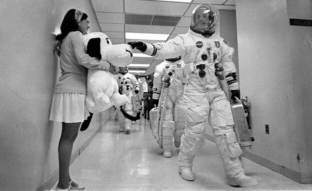 צוות "אפולו 10" עם סנופי (צילום: רויטרס)