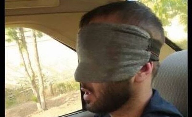 הראפר האיראני טומאג' סאלחי בעת מעצרו (צילום: ללא, איראן אינטרנשיונל)