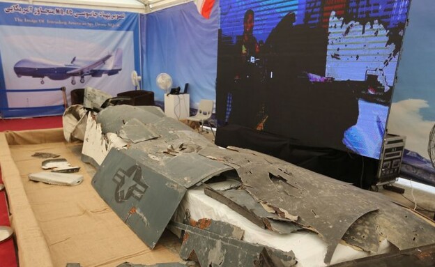 שרידי המל'ט שתפסה איראן (צילום: ATTA KENARE/AFP/GettyImages)