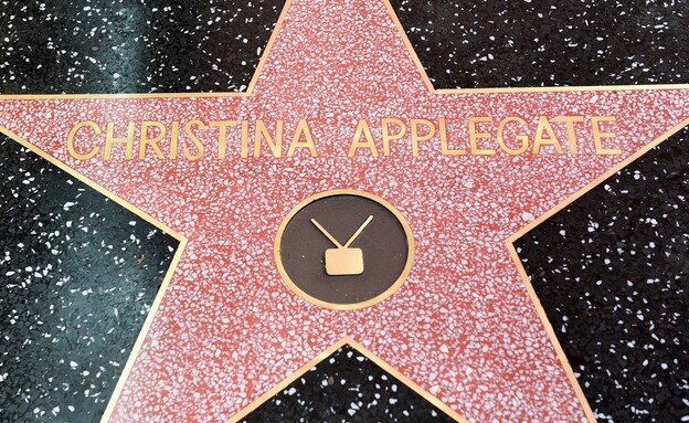 כריסטינה אפלגייט מקבלת כוכב בהוליווד (צילום: VALERIE MACON, AFP)