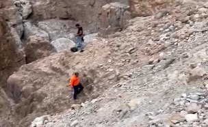 תיירת נפלה מצוק בנחל קדרון במדבר יהודה (צילום: דוברות כבאות והצלה לישראל | מחוז יו"ש תחנה אזורית בנימין)