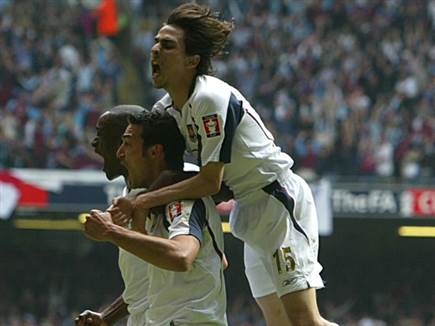 חוגג עם סקאלוני וריאו קוקר בגמר הגביע. זה נגמר בדמעות (Getty)