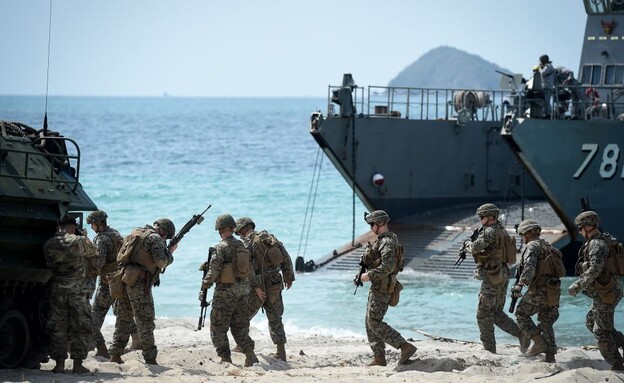 הכוחות בשטח הפעילות (צילום: LILLIAN SUWANRUMPHA/AFP/GettyImages)