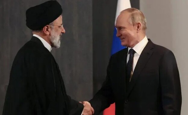 נשיא רוסיה לוחץ יד לנשיא איראן (צילום: רויטרס)