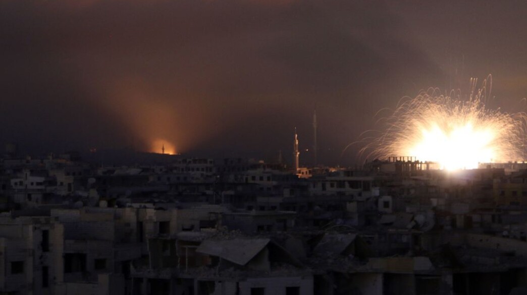 תקיפה לילית (צילום: MOHAMMED EYAD/AFP )