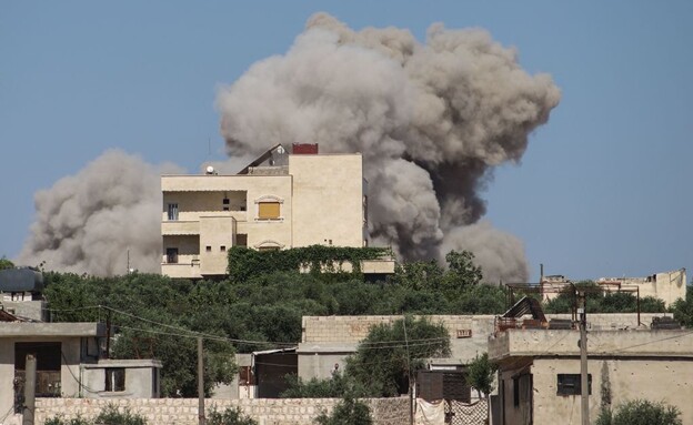 האש בסוריה (צילום: ABDULAZIZ KETAZ/AFP)