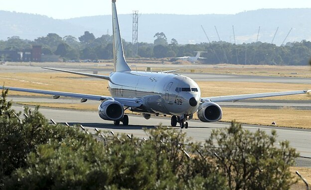 המטוס הייחודי (צילום: ROB GRIFFITH/AFP)