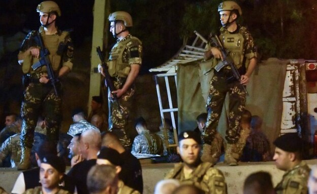 כוחות בזירה (צילום: AFP)