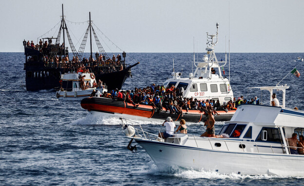 סירות מהגרים באי האיטלקי למפדוזה בים התיכון (צילום: רויטרס)
