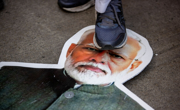 מפגינים סיקים מוחים נגד ראש ממשלת הודו מודי  (צילום: רויטרס)