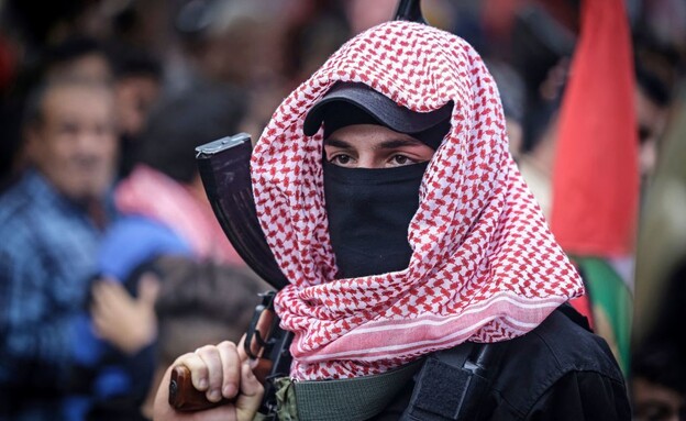 מחבל הארגון (צילום: MAHMUD HAMS/AFP via Getty Images)