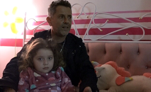 אלי אדרי והבת שלו (צילום: חדשות 12)