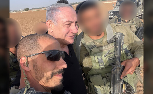 Roi Yafarah, accusé d'avoir usurpé l'identité d'un soldat, est armé aux côtés du Premier ministre de Netanya