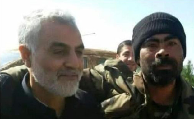 מפקד המיליציה האפגנית בסוריה עם קאסם סולימאני