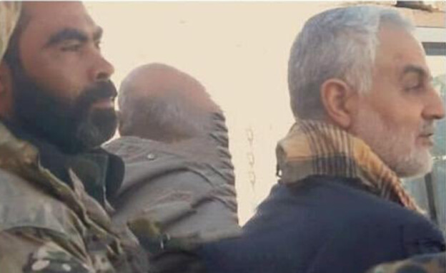מפקד המיליציה האפגנית בסוריה עם קאסם סולימאני