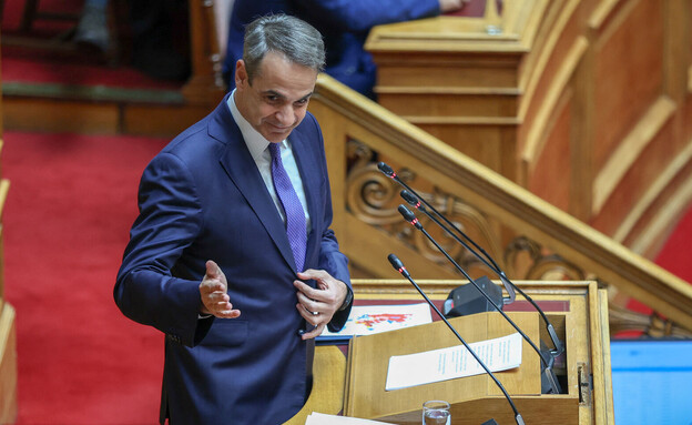 ראש ממשלת יוון, קיריאקוס מיצוטאקיס, נואם בעד שוויון בנישואין (צילום: ARIS OIKONOMOU/SOOC/AFP, GettyImages)