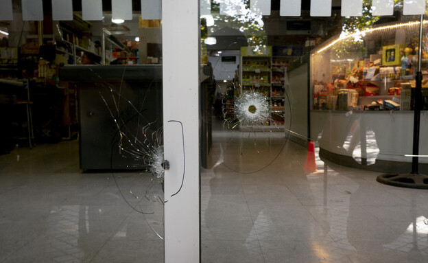 אנשי הכנופיות ירו על סופרמרקט של קרוב של מסי (צילום: ap)