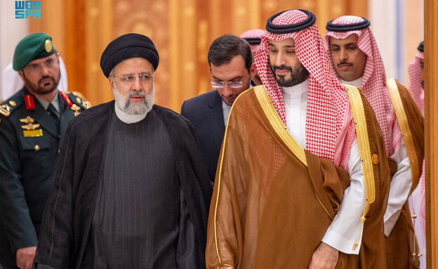 יורש העצר הסעודי מוחמד בן סלמאן ונשיא איראן ראיסי (צילום: רויטרס)