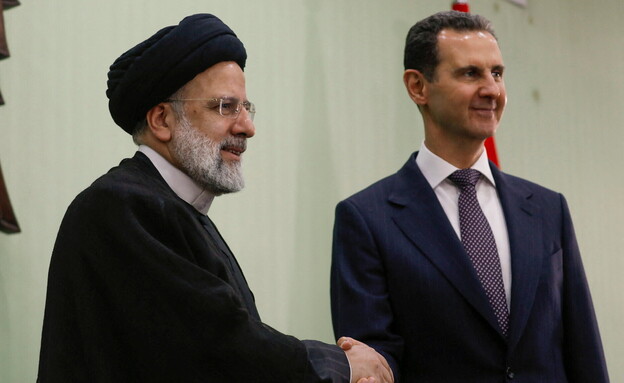 נשיא סוריה אסד ונשיא איראן ראיסי (צילום: רויטרס)