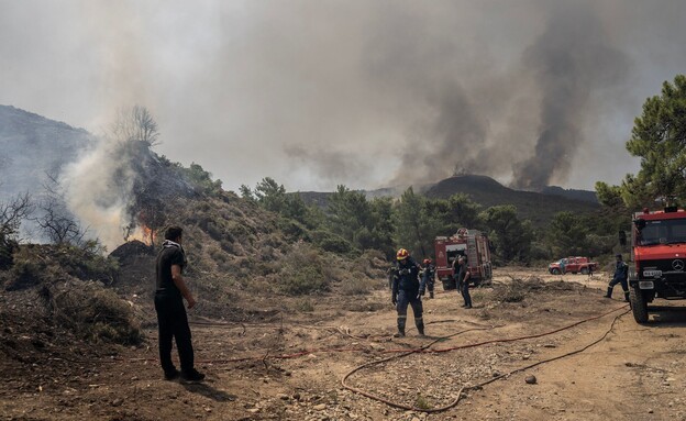 שריפות רודוס יוון (צילום: ANGELOS TZORTZINIS, getty images)