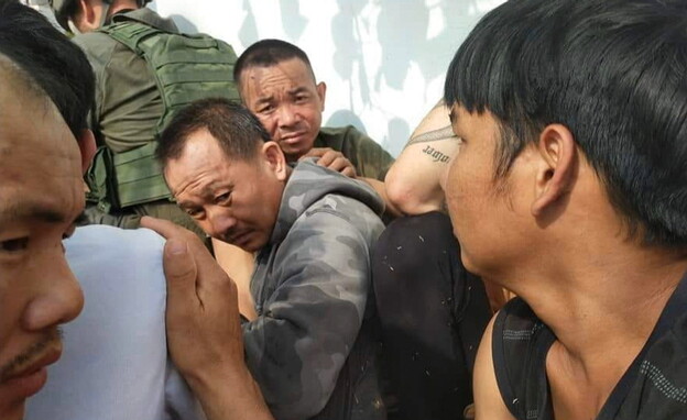 העובדים התאילנדים שניצלו בקרב בצומת מפלסים (צילום: חדשות 12)