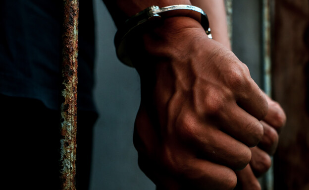 אסיר באזיקים (צילום: 123RF‏)