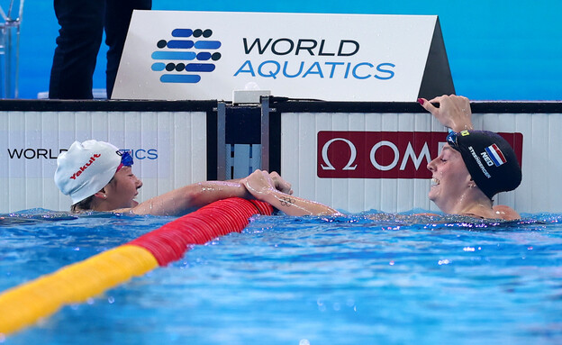 מריט סטיינברכן ושיבון הוהי באליפות העולם בשחייה בדוחא 2024 (צילום: Maddie Meyer Getty Images)