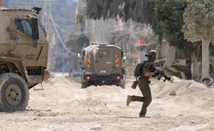 כוחות במבצע בגזרה (צילום: JAAFAR ASHTIYEH/AFP via Getty Images)