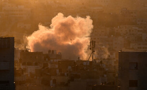 הפגיעה בתשתיות במרחב (צילום: RONALDO SCHEMIDT/AFP via Getty Images)