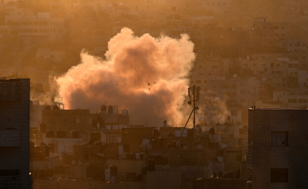 הפגיעה בתשתיות במרחב (צילום: RONALDO SCHEMIDT/AFP via Getty Images)