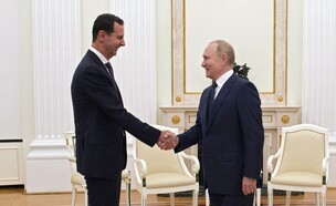 בשאר אל-אסד וולדימיר פוטין (צילום:  MIKHAIL KLIMENTYEV/SPUTNIK/AFP | Getty Images)