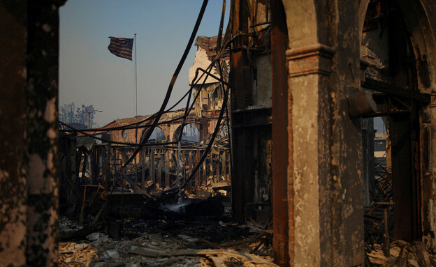 ההרס בעקבות השרפות בלוס אנג'לס (צילום: Daniel Cole, Reuters)