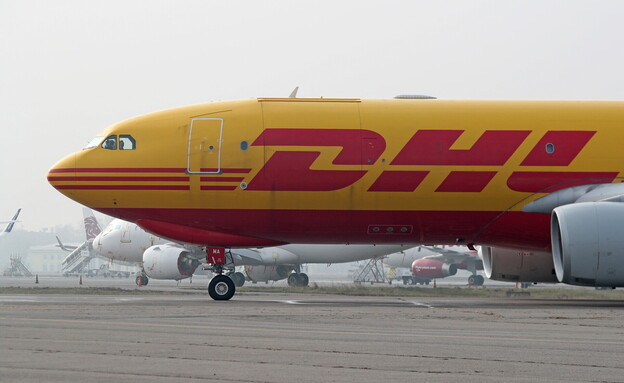 מטוס מטען של חברת השילוחים DHL שם נמצאו מטענים (צילום: רויטרס)